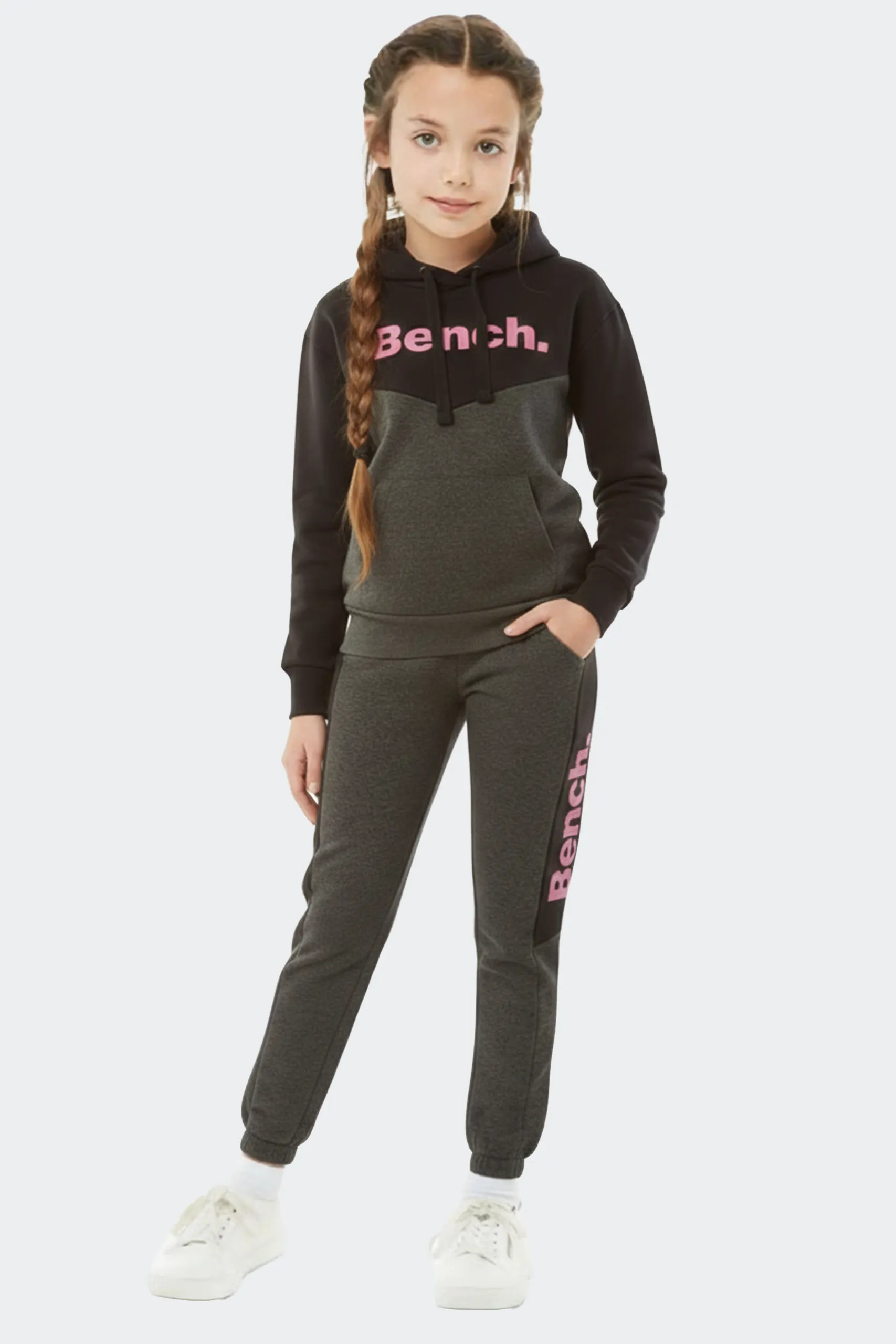 Kids wearing cotton blend tracksuit with hoodie and wide leg joggers in loose shoulder casual style