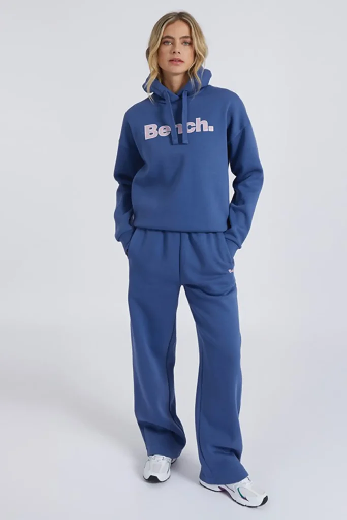 Women wearing cotton blend tracksuit with hoodie and joggers in casual style