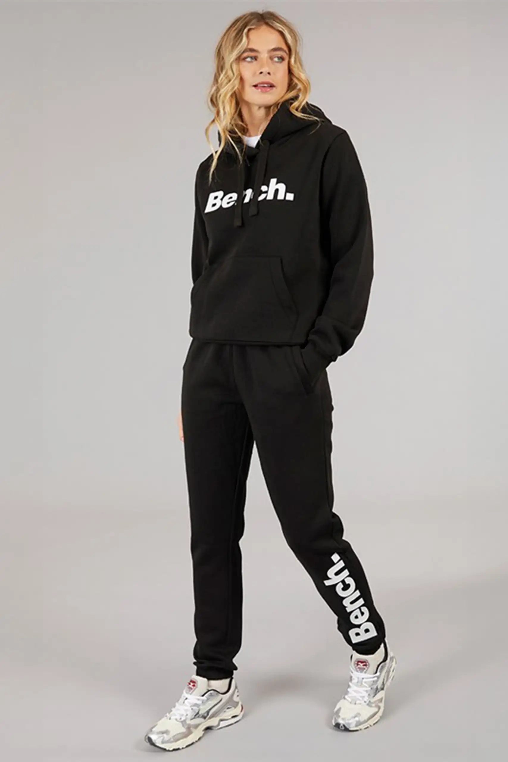 Women wearing cotton blend tracksuit with hoodie and joggers in casual style